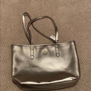 Gold coach purse